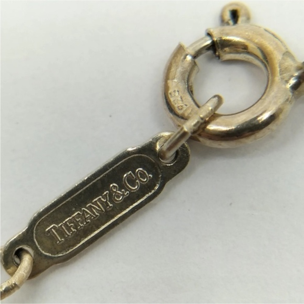 Tiffany & Co Silver Heart with 18kt Gold Ribbon Bow Necklace - Picture 6 of 11